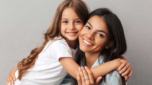 A mother and daughter smiling after an Emergency Dentistry Decatur IL