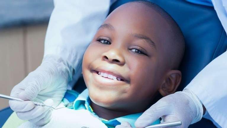 A child smiling during Orthodontic treatment in Decatur, IL