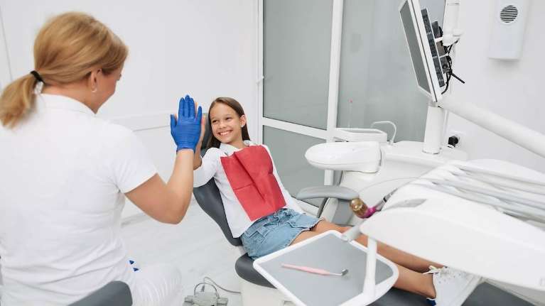 Kid smiling during Dental Emergency in Decatur, IL