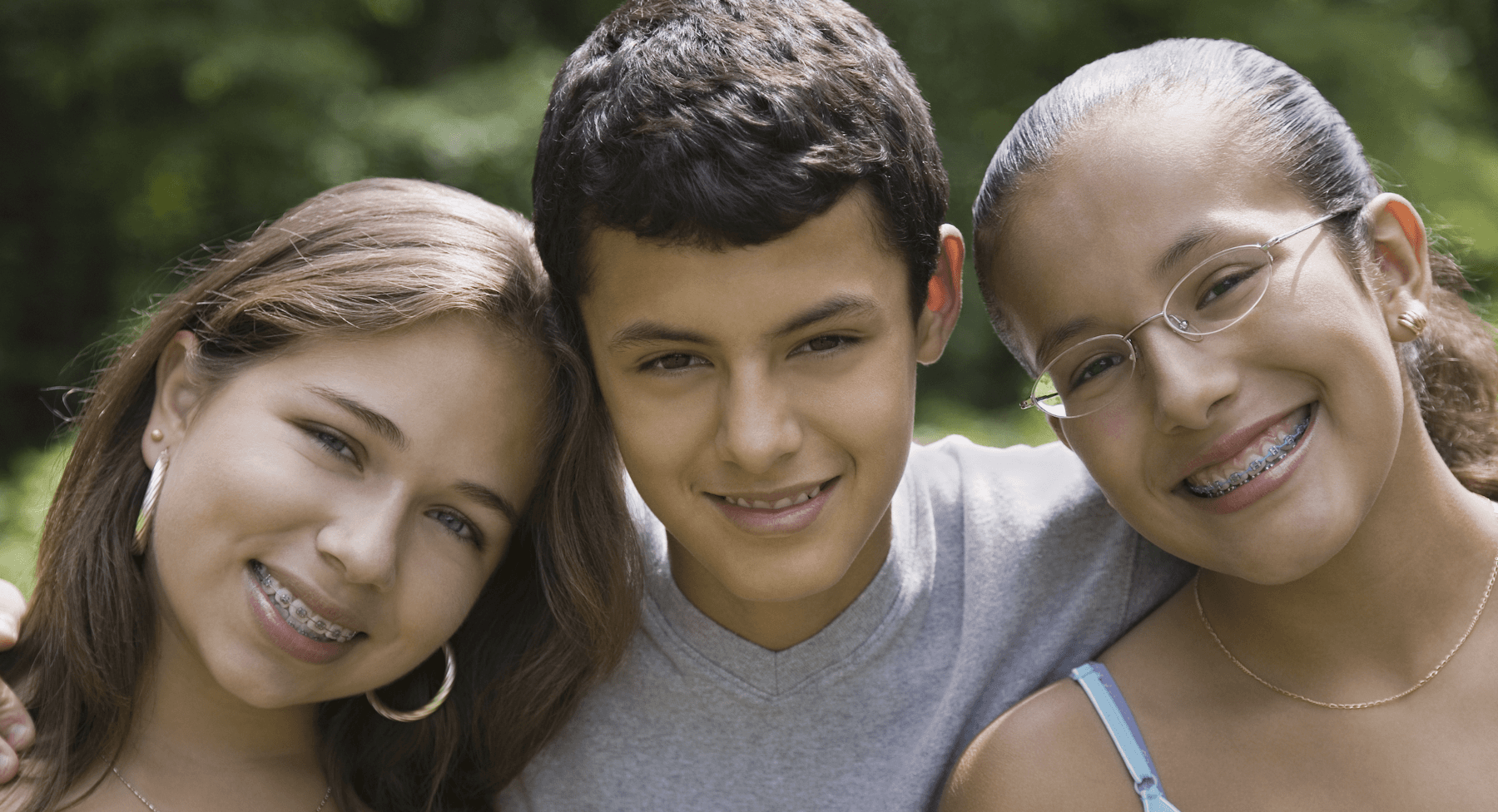 Kids pose for a photo after getting braces from Jerger Pediatric Dentistry